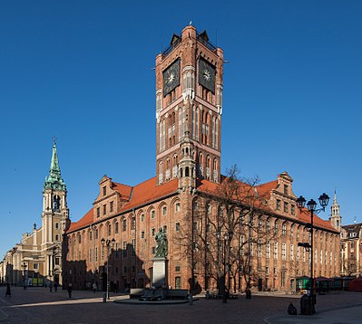 Among the listed properties, which one is owned by Toruń?