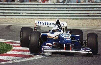 What year did Damon Hill retire from racing?