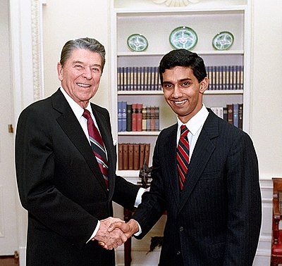 In which city did D'Souza attend college as an exchange student?