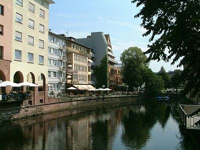 What is Pforzheim's location in relation to Stuttgart and Karlsruhe?
