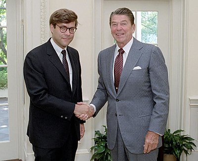 Which president pardoned six officials involved in the Iran-Contra affair under Barr's advice?