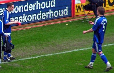 Which club did Vermaelen captain after Klaas-Jan Huntelaar's departure?