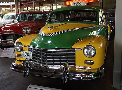 In which year did Checker Motors Corporation change its name from Checker Cab Manufacturing Company?