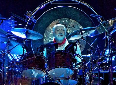 Mick Fleetwood lived in which two countries during his childhood?