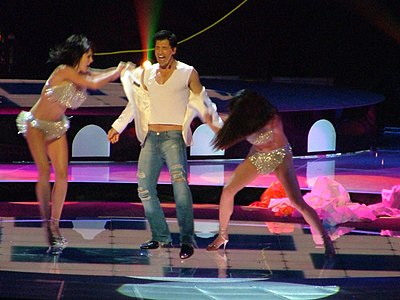 What is Sakis Rouvas's specialty in the world of sports?