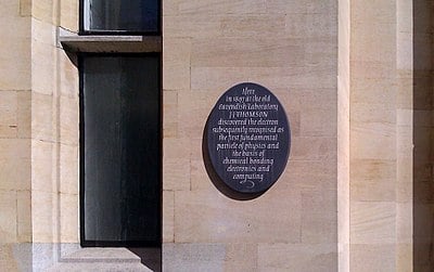 What prestigious scientific society did J.J. Thomson belong to as a Fellow?