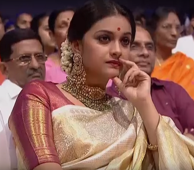 What is the name of Keerthy Suresh's father?