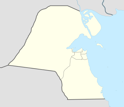 What is the predominant religion in Kuwait City?