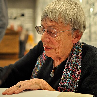 Which philosophical short story by Ursula K. Le Guin explores alternative political structures?