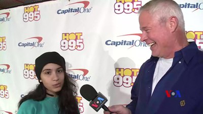 Who did Alessia Cara feature alongside on the song "1-800-273-8255"?