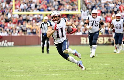 What position did Julian Edelman play in the NFL?