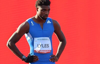How many gold medals did Lyles win at the 2019 World Championships?
