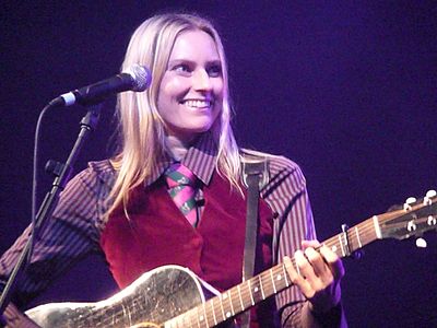 Which NPR list included Aimee Mann as one of the greatest living songwriters in 2006?