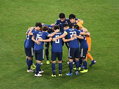 Which sport are Japan National Football Team predominantly associated with?