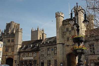 Which king founded a minster church in Wells?