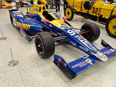 Which F1 team did Alexander Rossi serve as a test and development driver for?