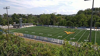 What is the maximum number of people that can be present at [url class="tippy_vc" href="#3538455"]Mountaineer Field At Milan Puskar Stadium[/url], the home of West Virginia Mountaineers Football?