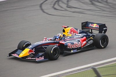 At which Grand Prix did Carlos Sainz Jr. take his first F1 pole position and career win?