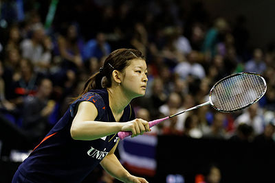 Which company sponsored Ayaka Takahashi's badminton team?