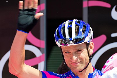 At what age did Scarponi start cycling?