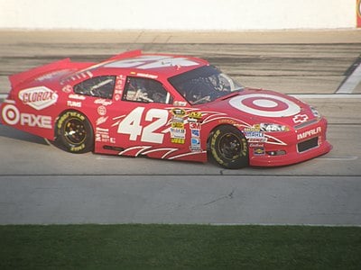 In which car racing series did Montoya win in 1999?