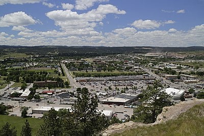 Rapid City is twinned with which city or administrative body?