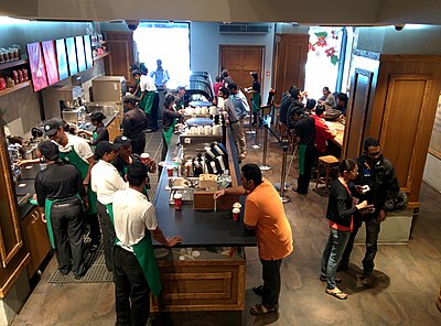 How many Starbucks stores are there worldwide as of November 2021?