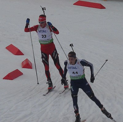 Who is Tarjei Bø's famous biathlete younger brother?