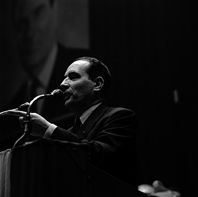 Which controversial decision did Mitterrand make regarding the Communist Party?