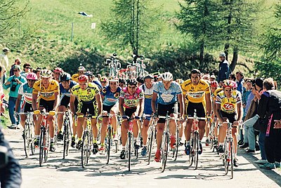 Who was the first professional cyclist to sign a million-dollar contract?