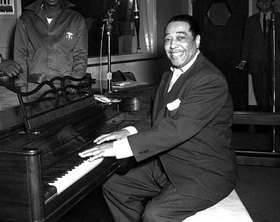 What was the main reason for Duke Ellington's orchestra gaining national fame?