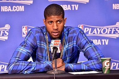 In his early days, which player did Paul George idolize and model his game after?