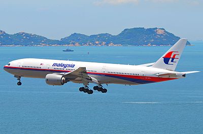 Which two cities are served by Malaysia Airlines' secondary hub, Kota Kinabalu International Airport?