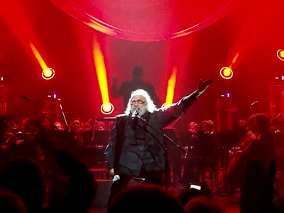 Roussos collaborated with which famous composer on "Race to the End"?