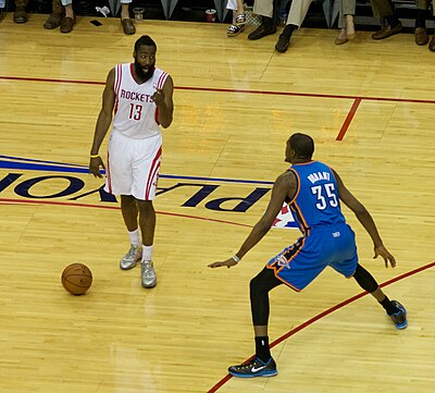 In which year did James Harden lead the league in assists for the first time?