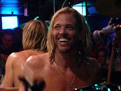 What year did Taylor Hawkins join Foo Fighters?