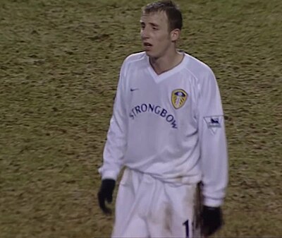 Against which team did Lee Bowyer score a famous hattrick while playing for Leeds United?