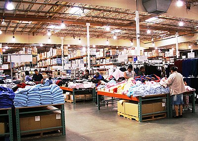 In which year did Costco open its first warehouse in Canada?
