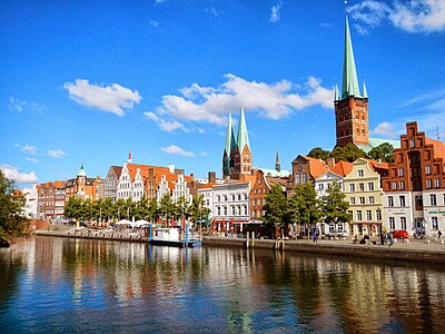 What was the population of Lübeck in 2021, given that it was 212,958 in 2013?