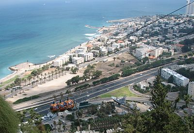 Which faith's World Centre is located in Haifa?