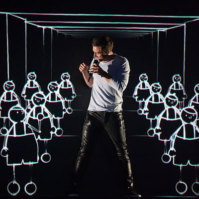 Who joined Måns Zelmerlöw to host the Eurovision Song Contest 2016?
