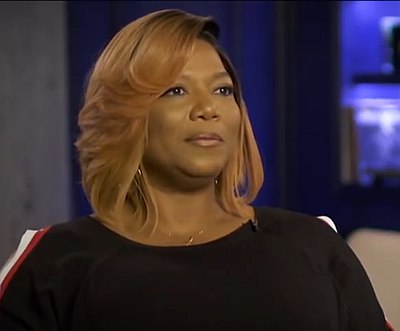 What was Queen Latifah's first single?