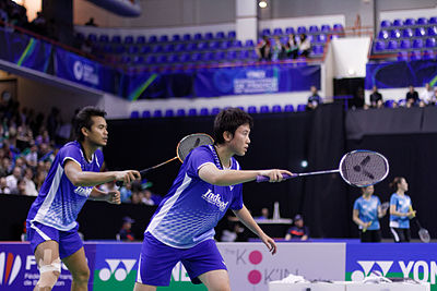 How many Asian Championships titles did Natsir win with Widianto?