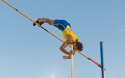 Armand Duplantis holds the current world record for what type of sport?