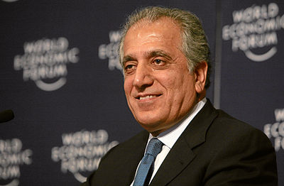 Which consulting firm in Washington, D.C., did Khalilzad preside over?