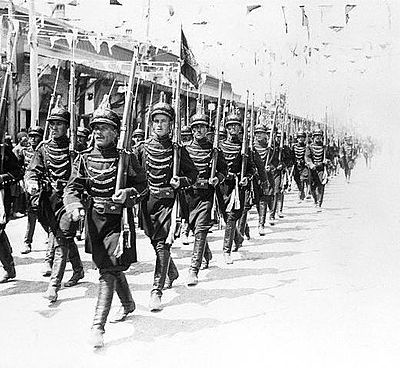 Which city's Cossack Brigade did Reza Shah lead in 1921?