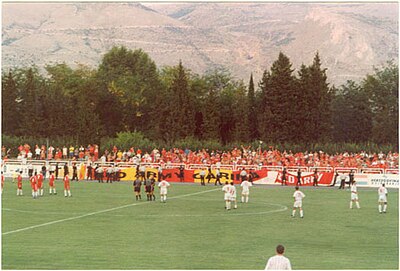 What is the capacity of FK Velež Mostar's historic stadium, Bijeli Brijeg?