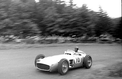 Fangio won how many Grand Prix International Championships?