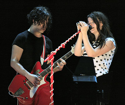 What renowned country artist did Jack White produce an album for?