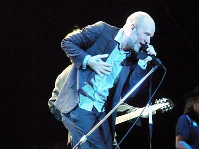 Which aspect of visual art did Michael Stipe NOT directly handle for R.E.M.?